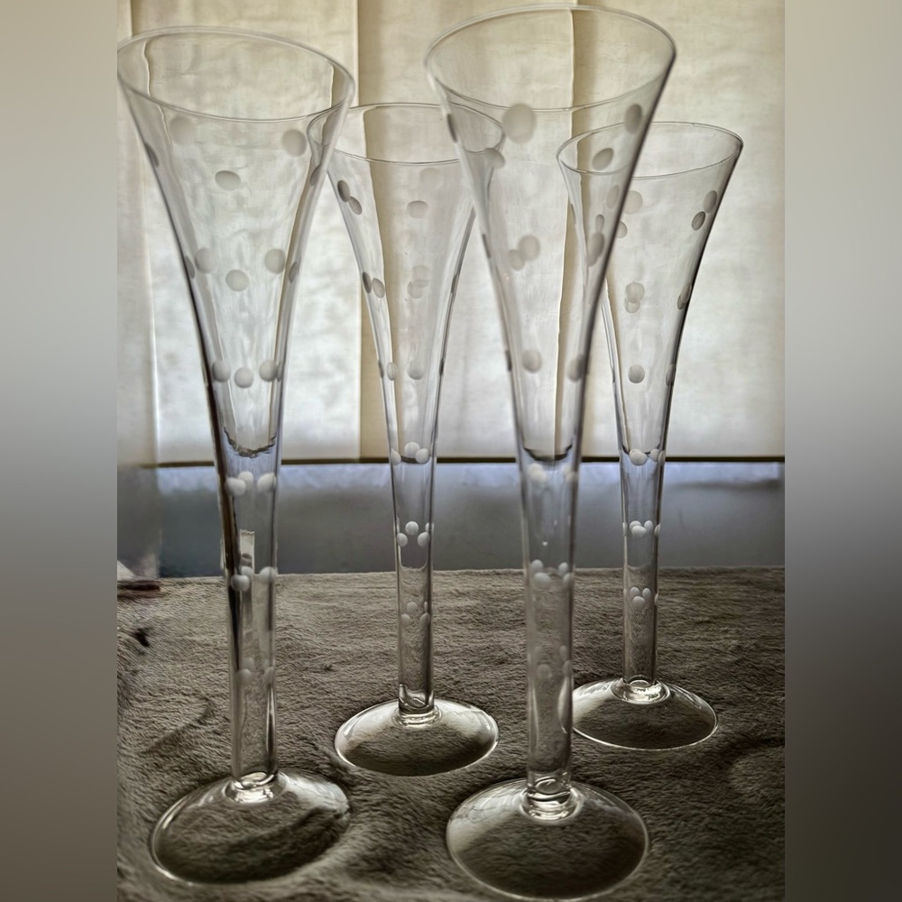 4 Polka Dot champagne flutes with hollow stems. 11”H